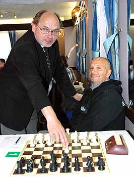 Seamus Whelan (left) makes the first move for Hubert Armand in the Tony Bridson Major